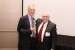 Dr. Nagib Callaos, General Chair, giving Dr. Russell Jay Hendel a award "In Appreciation for Delivering a Great Keynote Address at a Plenary Session."